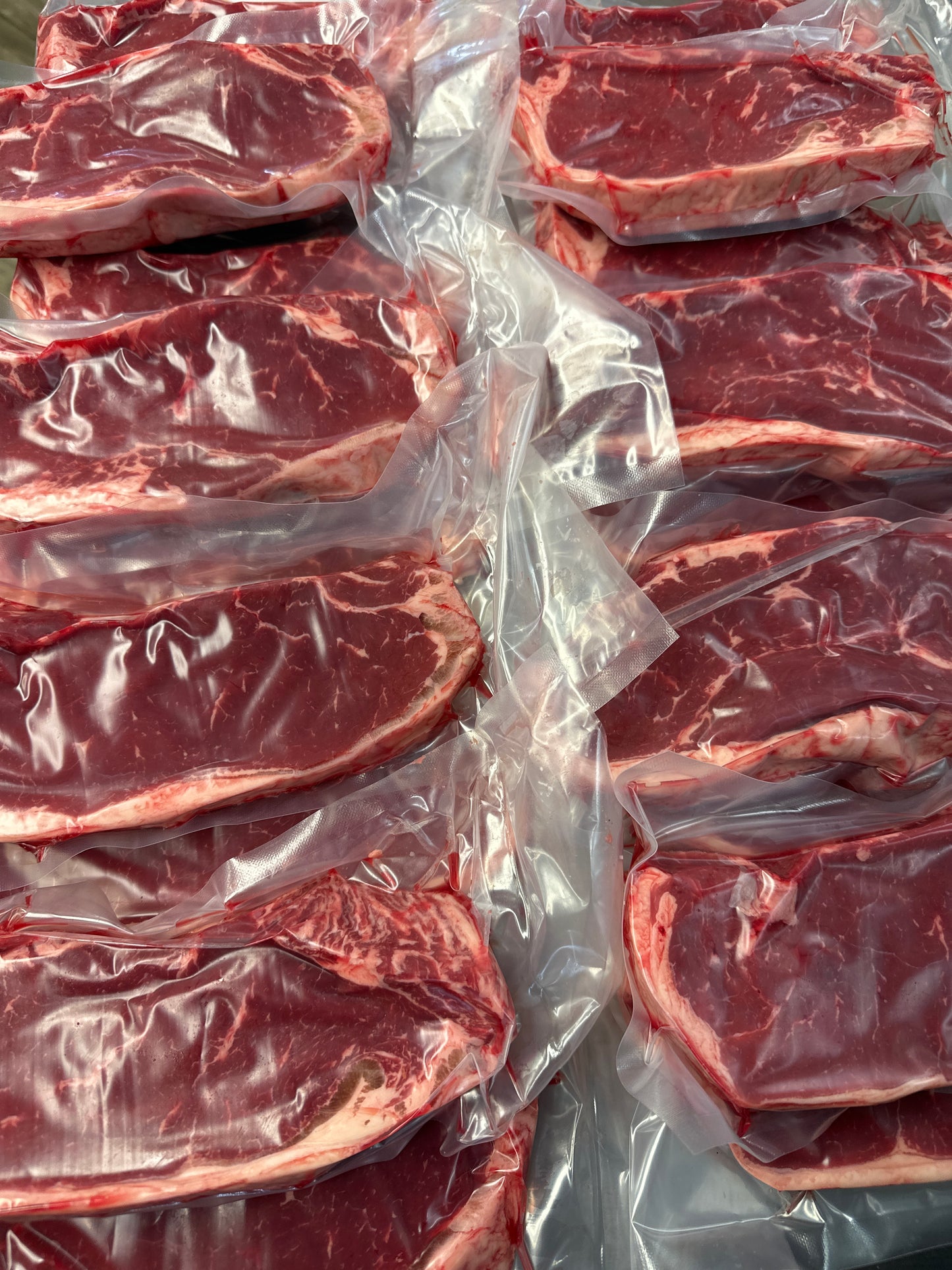 AAA WHOLE STRIPLOIN - CUT ANY SIZE AND VACUMED 11-12lbs APPROXIMATELY 18x1” cut
